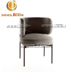 Upholstered chair with armrests